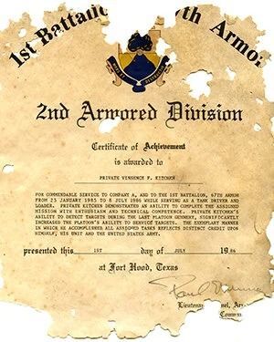 Vintage certificate with U.S. Army 2nd Armored Division crest on parchment background