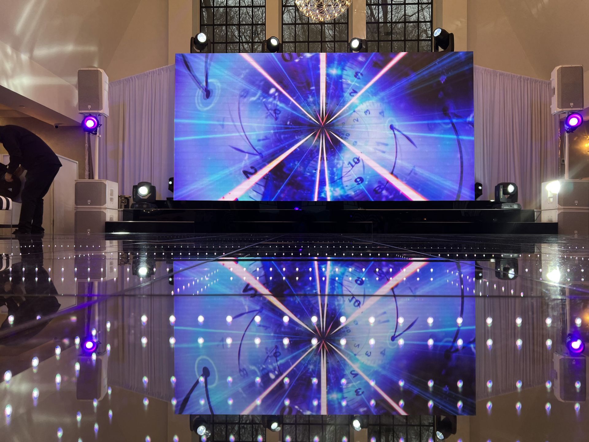LED Video Wall and A large screen is sitting on top of a dance floor.