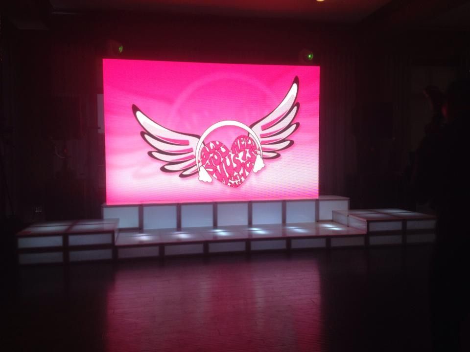 LED Video Wall and A large screen with a heart and wings on it