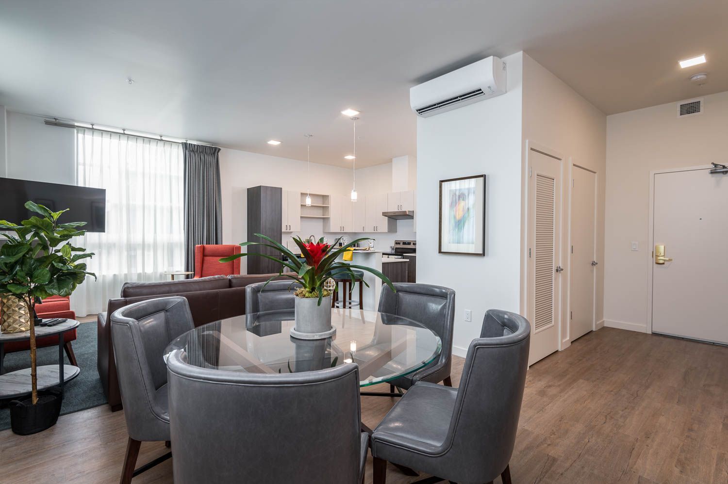 photo of furnished living room and dining area