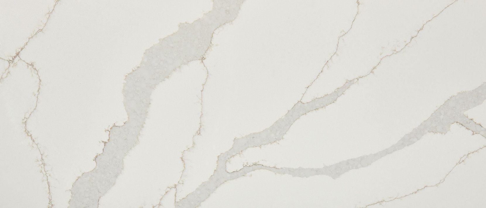 White quartz countertop with gray veining.