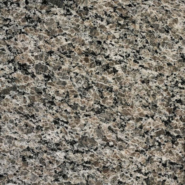 Close-up of a granite countertop with a speckled pattern in shades of gray, brown, and black.