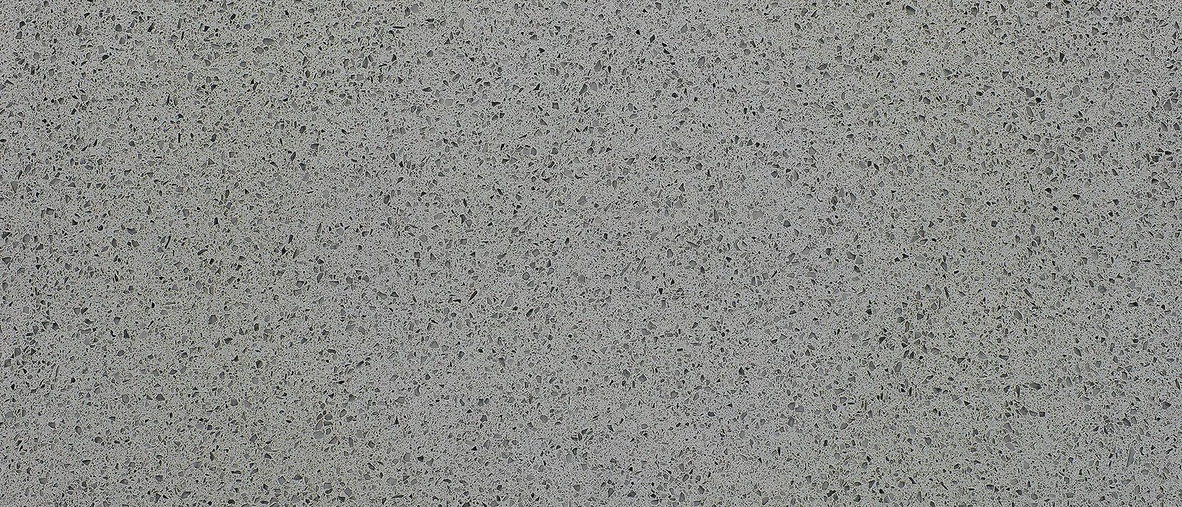 Close-up of a gray, textured surface, possibly concrete or a similar material.