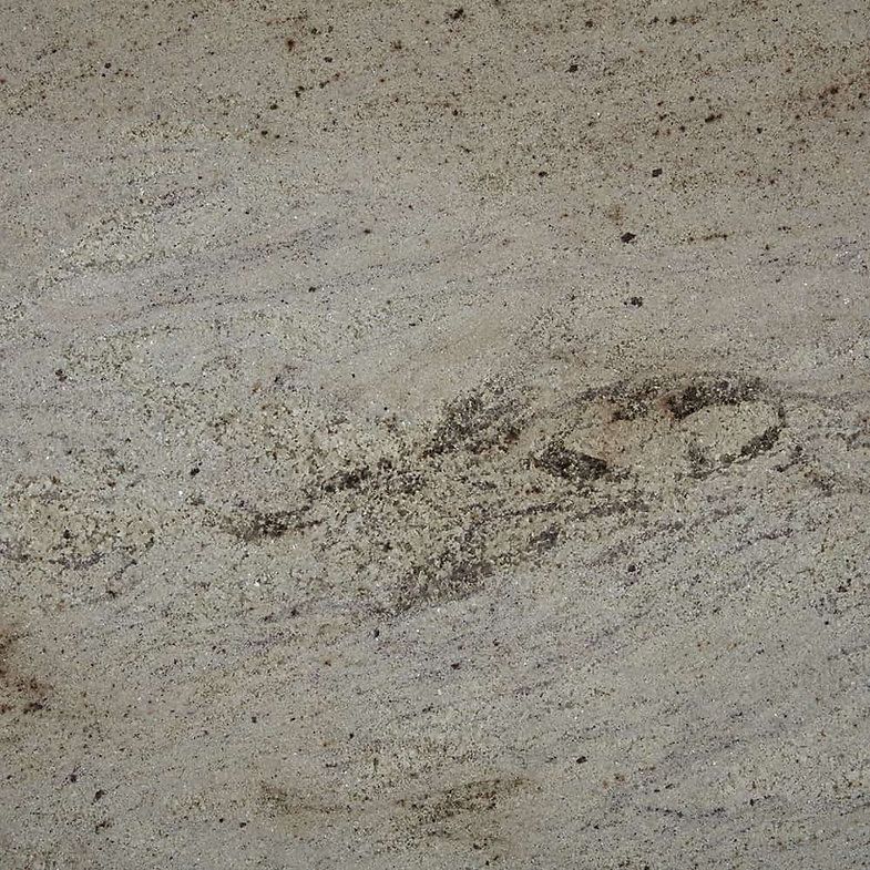 Beige granite with dark, flowing veins and speckled details.