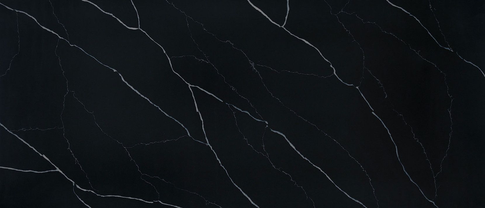 Black countertop with white veining.