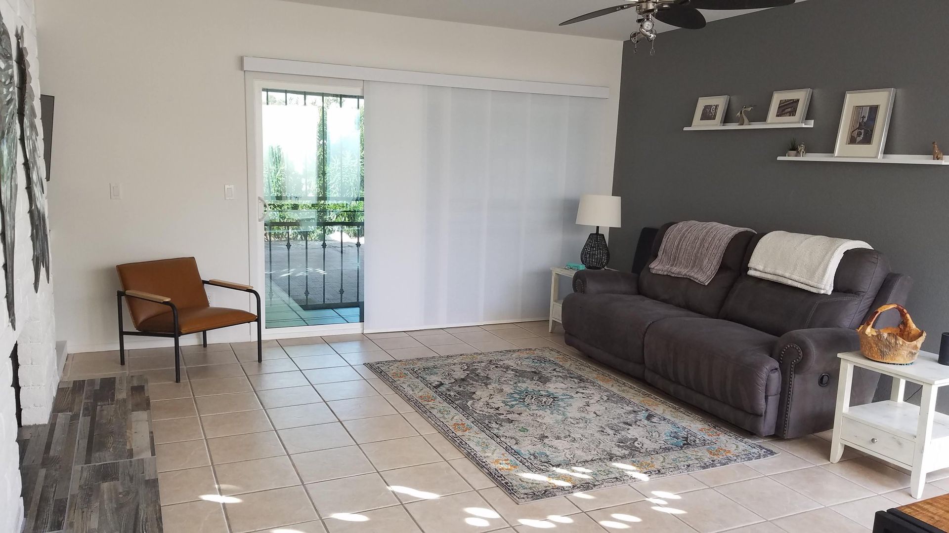 living room with tile flooring