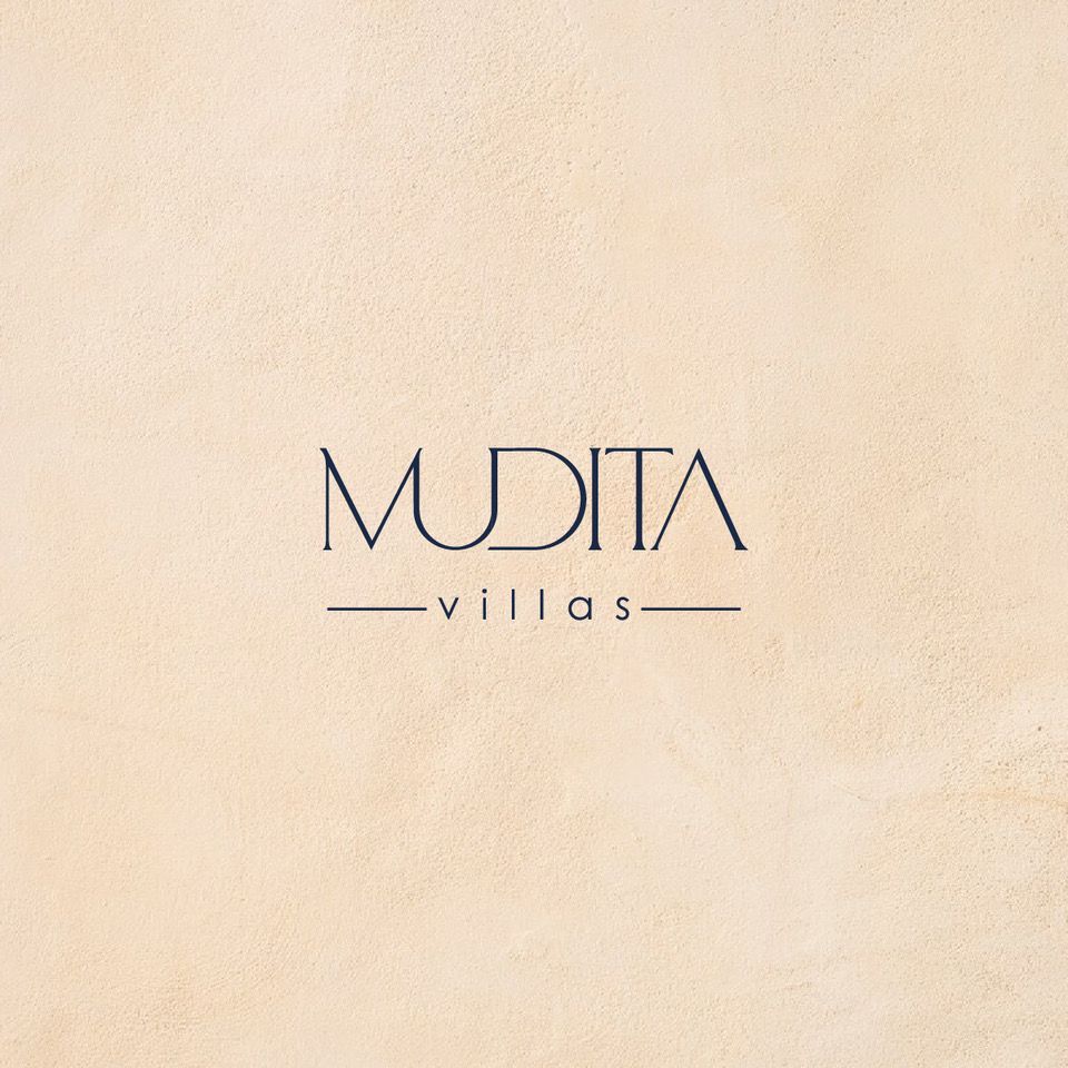 A logo for a company called mudita villas