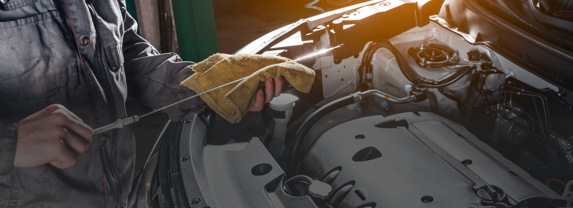 A mechanic working on a vehicle  | Top Gun Auto Repair