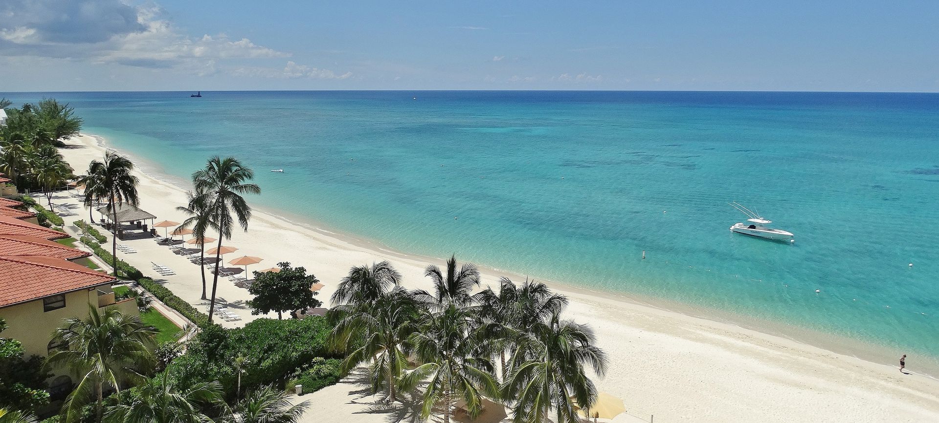Beach in Cayman Islands near one of our properties listed by THPM Cayman Island Realtors. Beach with white sand.