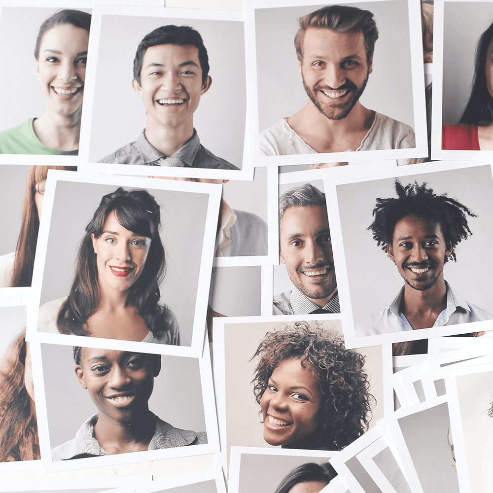 Collage of smiling headshots arranged in overlapping white photo prints