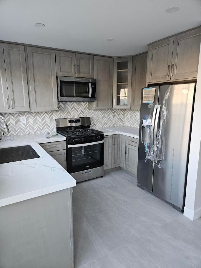 Contemporary Kitchen Remodel by 1 Stop Kitchen and Bath — Project 1 project photo 2