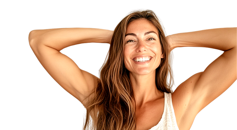 A woman is smiling with her hands behind her head.