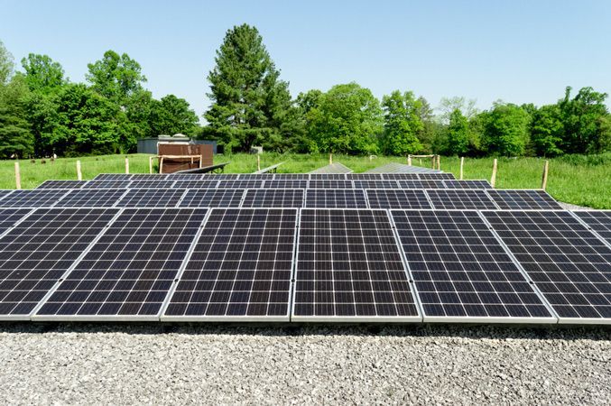 A Lot of Solar Panels are Sitting on the Ground in a Field — Nelson Keane & Hemingway Lawyers in Dubbo, NSW
