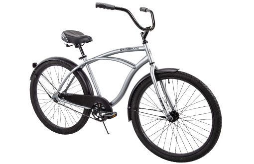 Silver cruiser bicycle with black fenders and handlebars, parked outdoors.