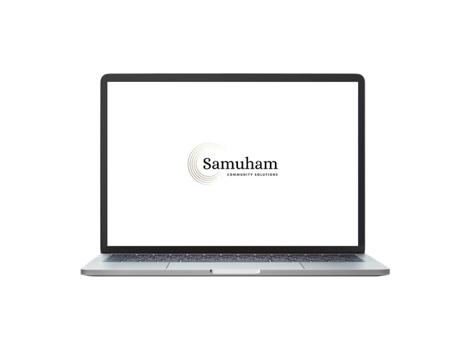 Laptop displaying the Samuham Community Solutions logo.
