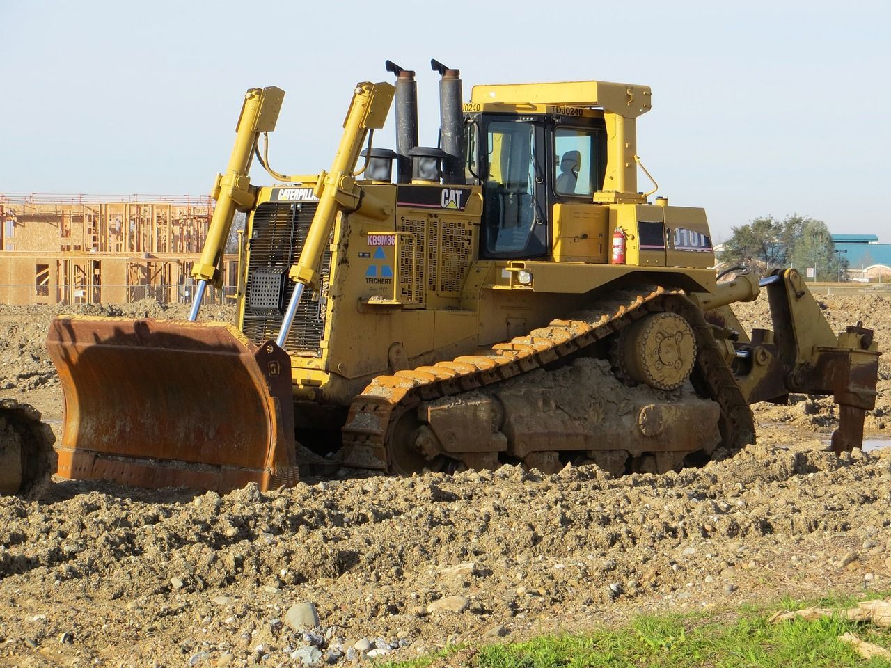 a yellow bulldozer working