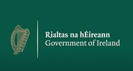The Government of Ireland logo featuring a golden harp symbol beside the text