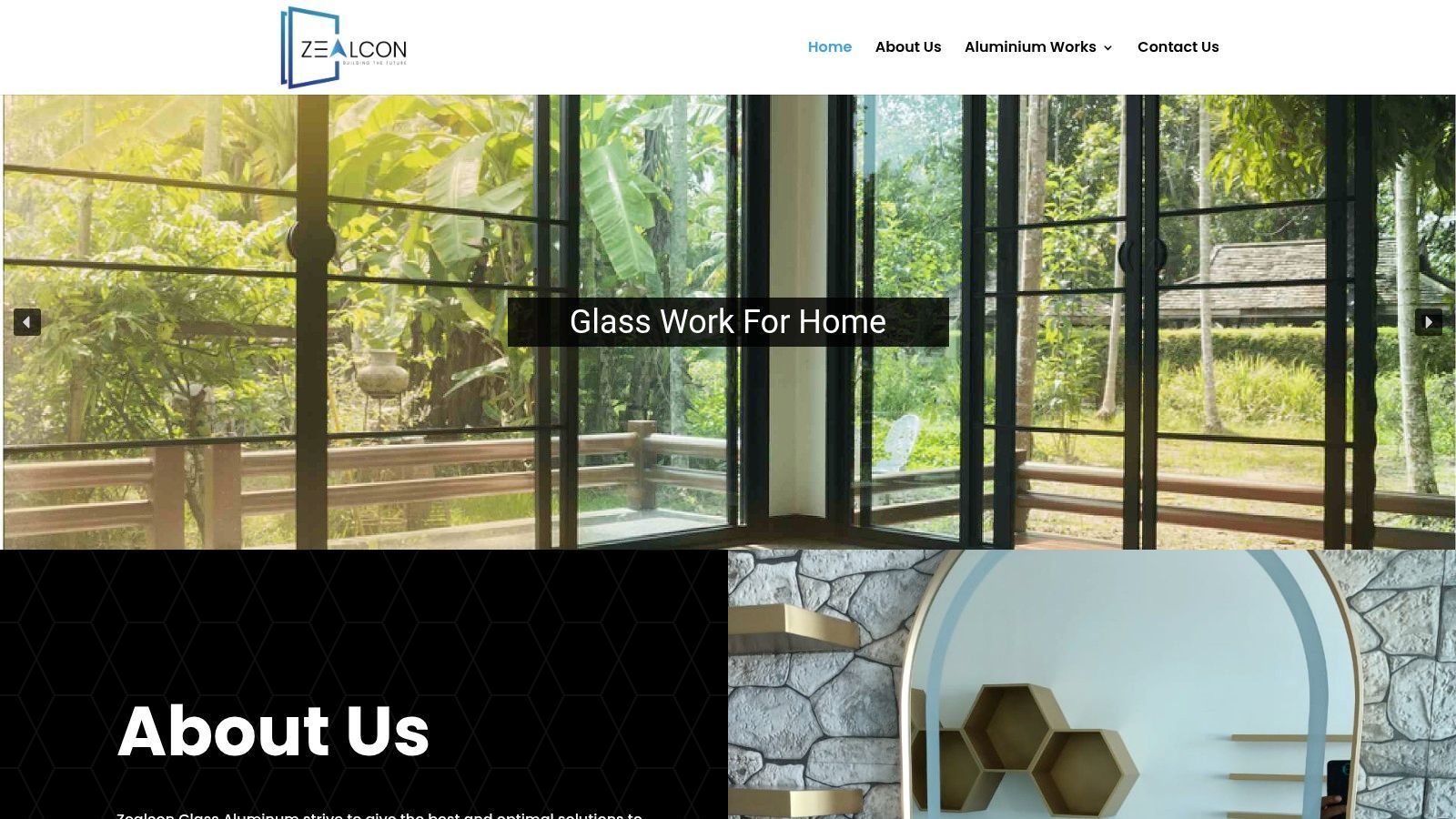 Website homepage featuring glass work, with a large window, nature view, and an