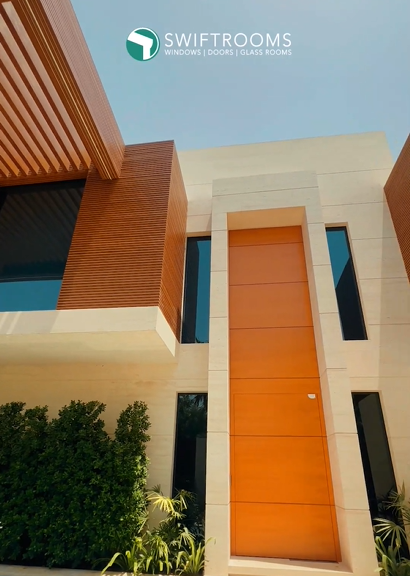 tinted glass curtainwall system and windows  in Al Barari Dubai