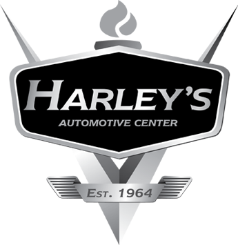 Harley’s Automotive Center logo with a silver and black badge, flame icon, and “Est. 1964” text