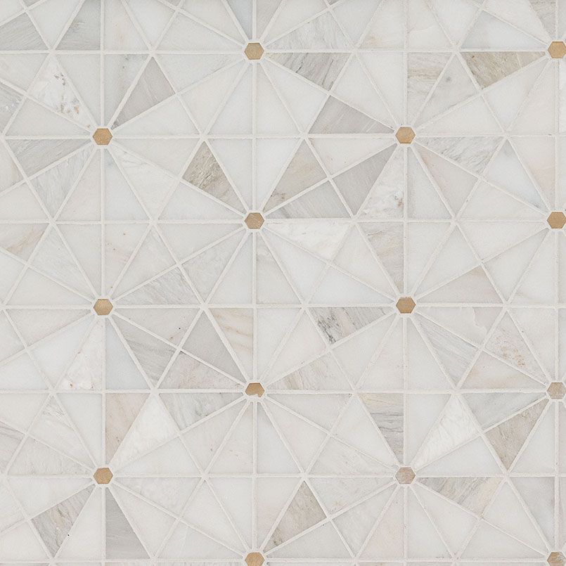 A close up of a tile with a geometric pattern on it.