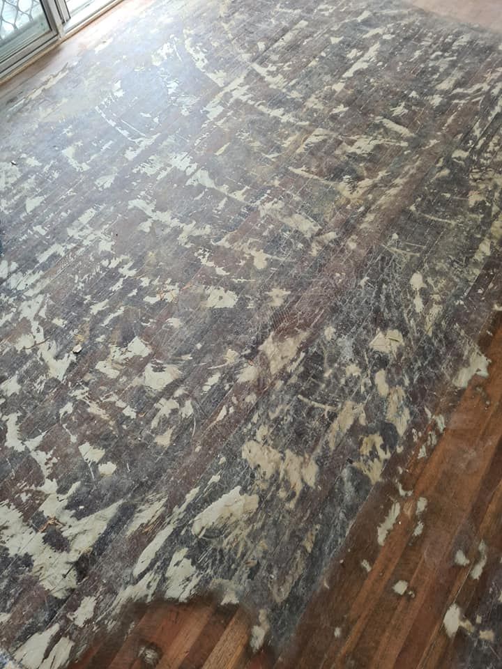 A Wooden Floor With a Lot of Dust on It — Alan Aldridge Floor Sanding in Urraween, QLD