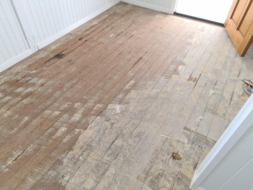 A Room With a Wooden Floor and a Door — Alan Aldridge Floor Sanding in Maryborough, QLD
