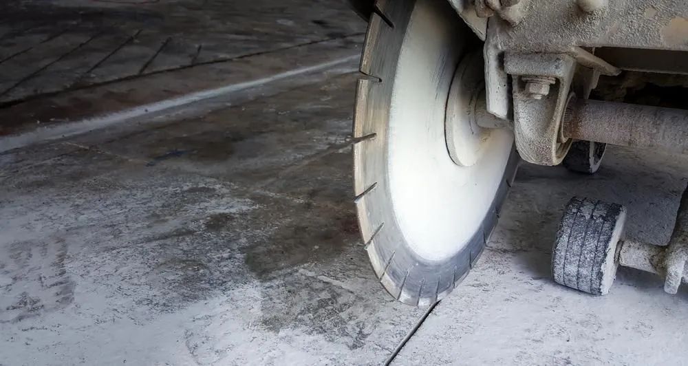 A Close Up of a Concrete Grinding — Alan Aldridge Floor Sanding in Urraween, QLD