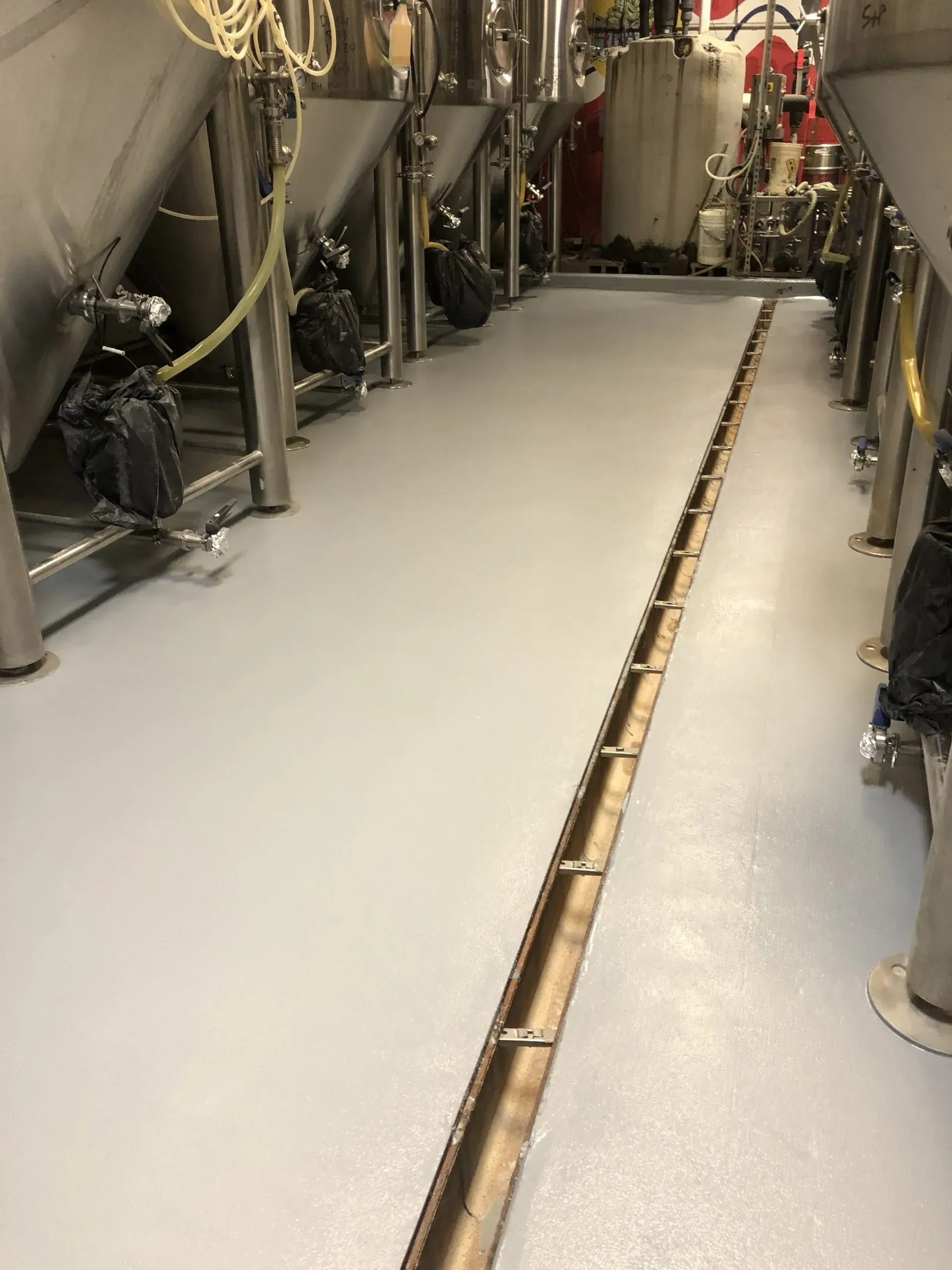 After Pouring Concrete on the Factory Flooring — Fishers, IN — High-Tech Flooring