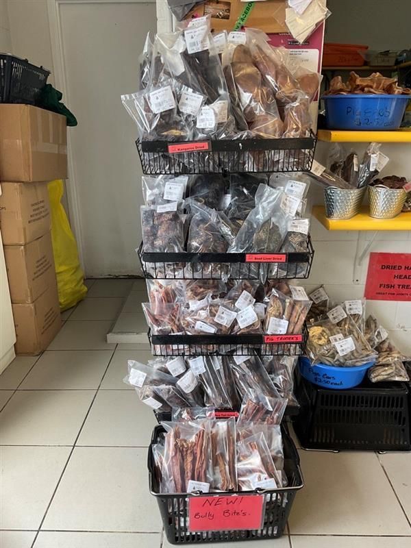 Various Pet Treats Stand in Store — NQ GAME MEAT in Currajong, QLD