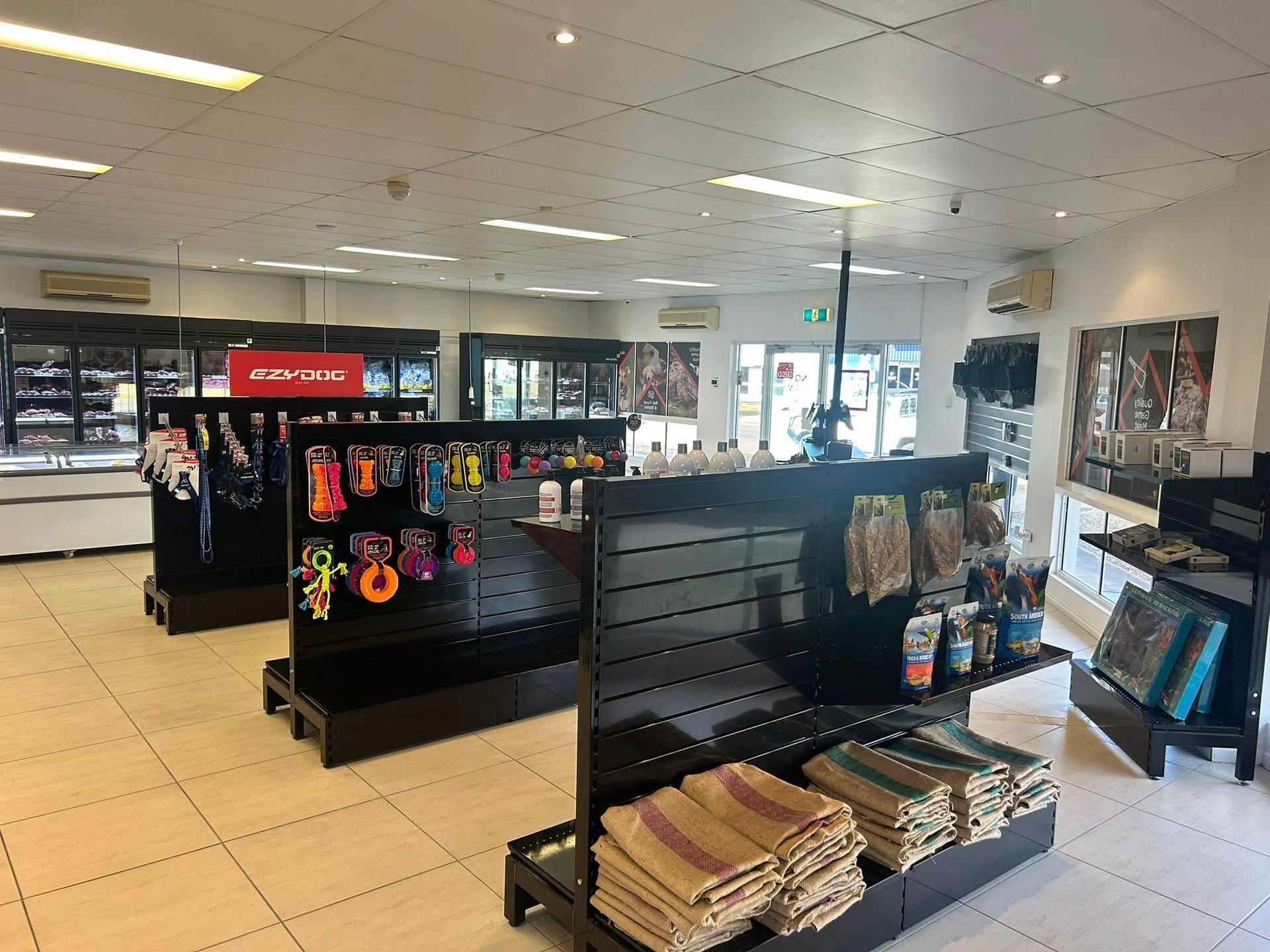 Pet Store Interior With Shelves Displaying Pet Toys and Supplies — NQ GAME MEAT in Currajong, QLD