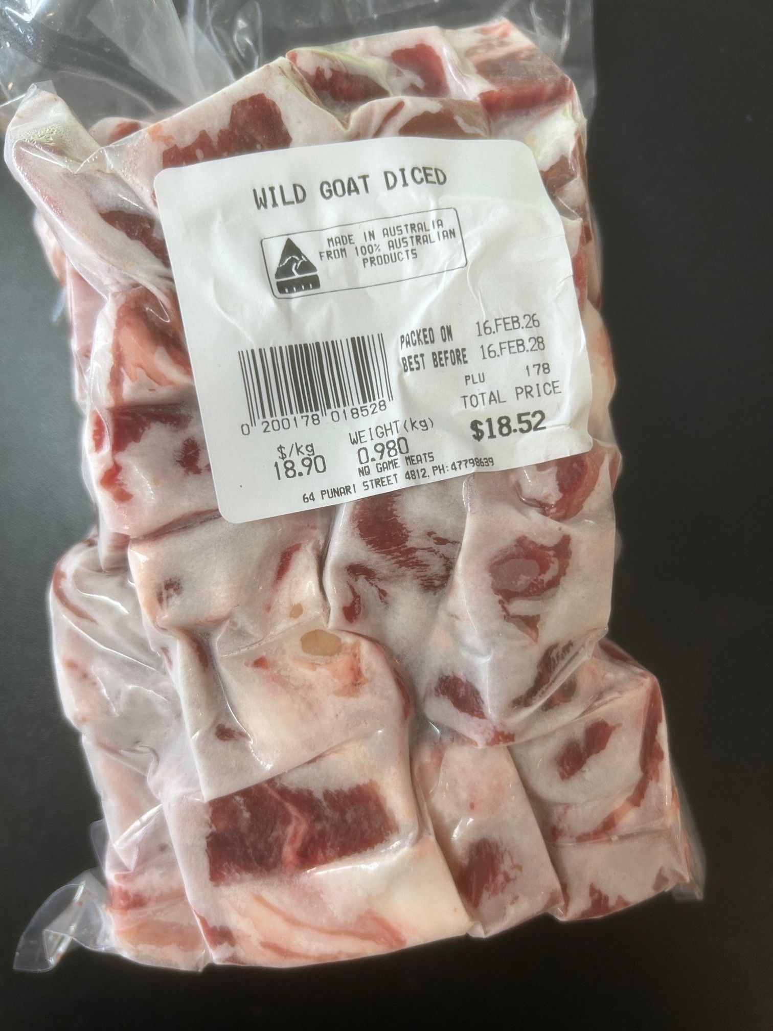 Package of diced wild goat meat with a label — NQ GAME MEAT in Currajong, QLD