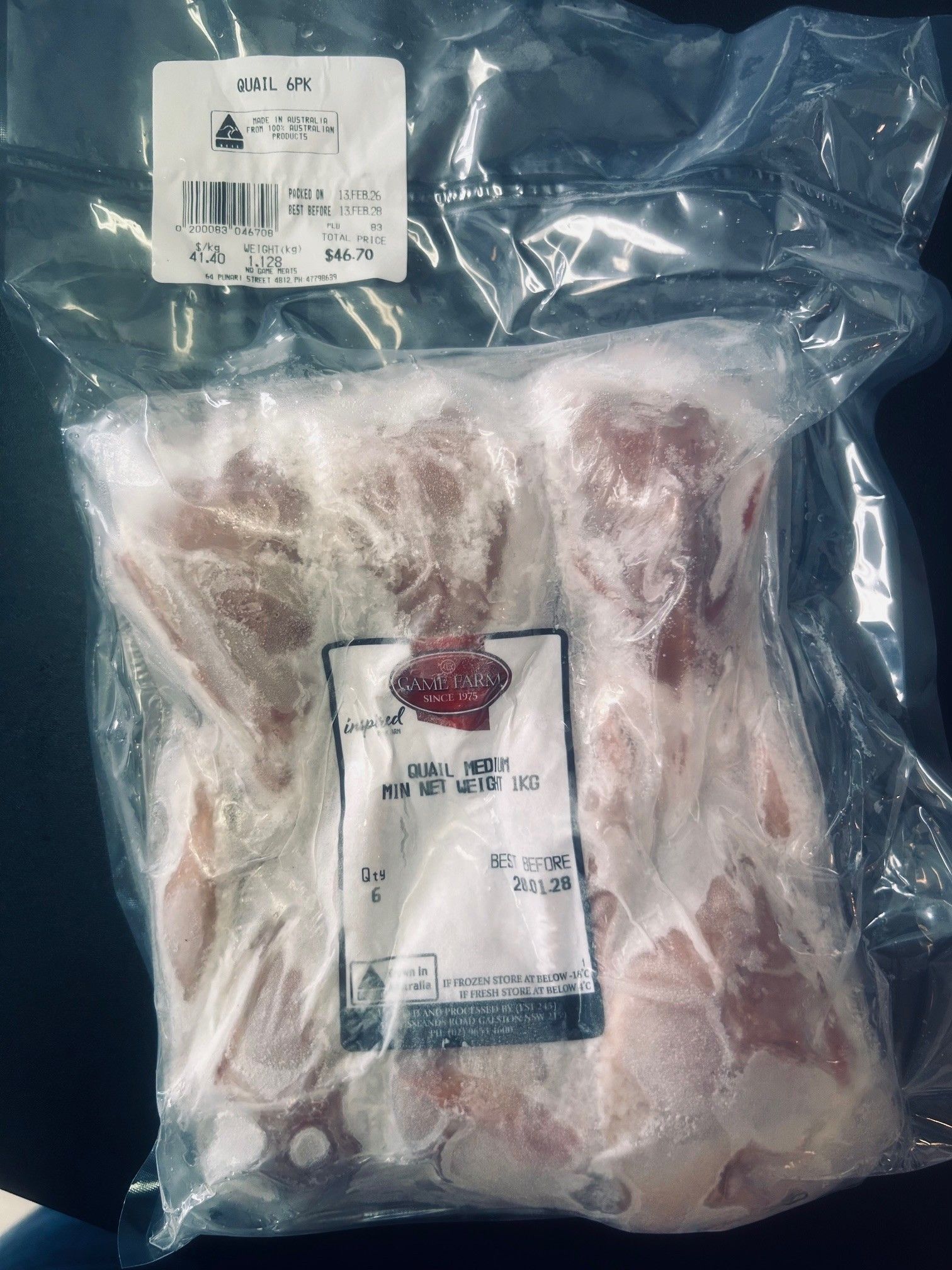 Sealed plastic bag of frozen lamb shanks with white labels — NQ GAME MEAT in Currajong, QLD