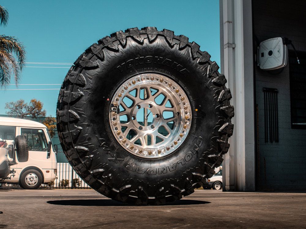 Tyre Displayed in Front of A Garage