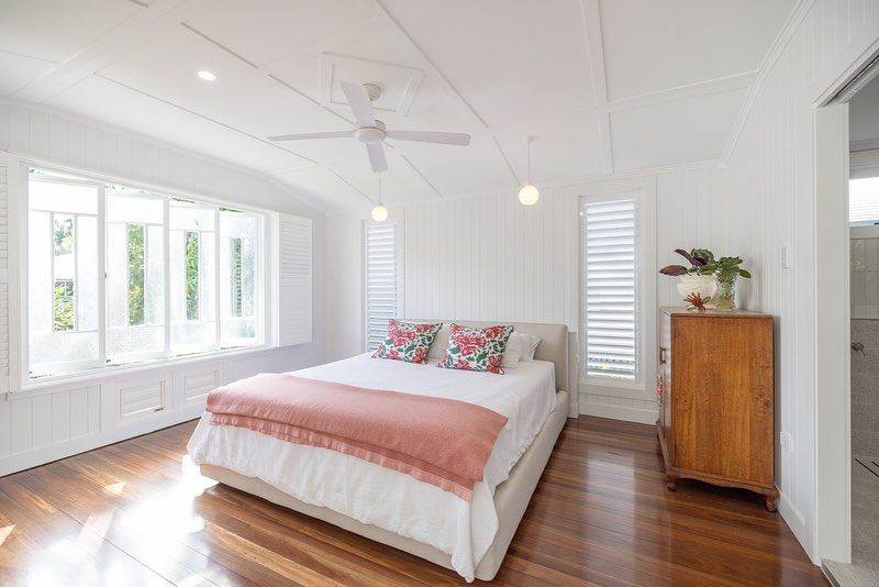 Long Hallway with Wooden Floors and Lots of Windows — Ironbark Built Townsville in Currajong, QLD