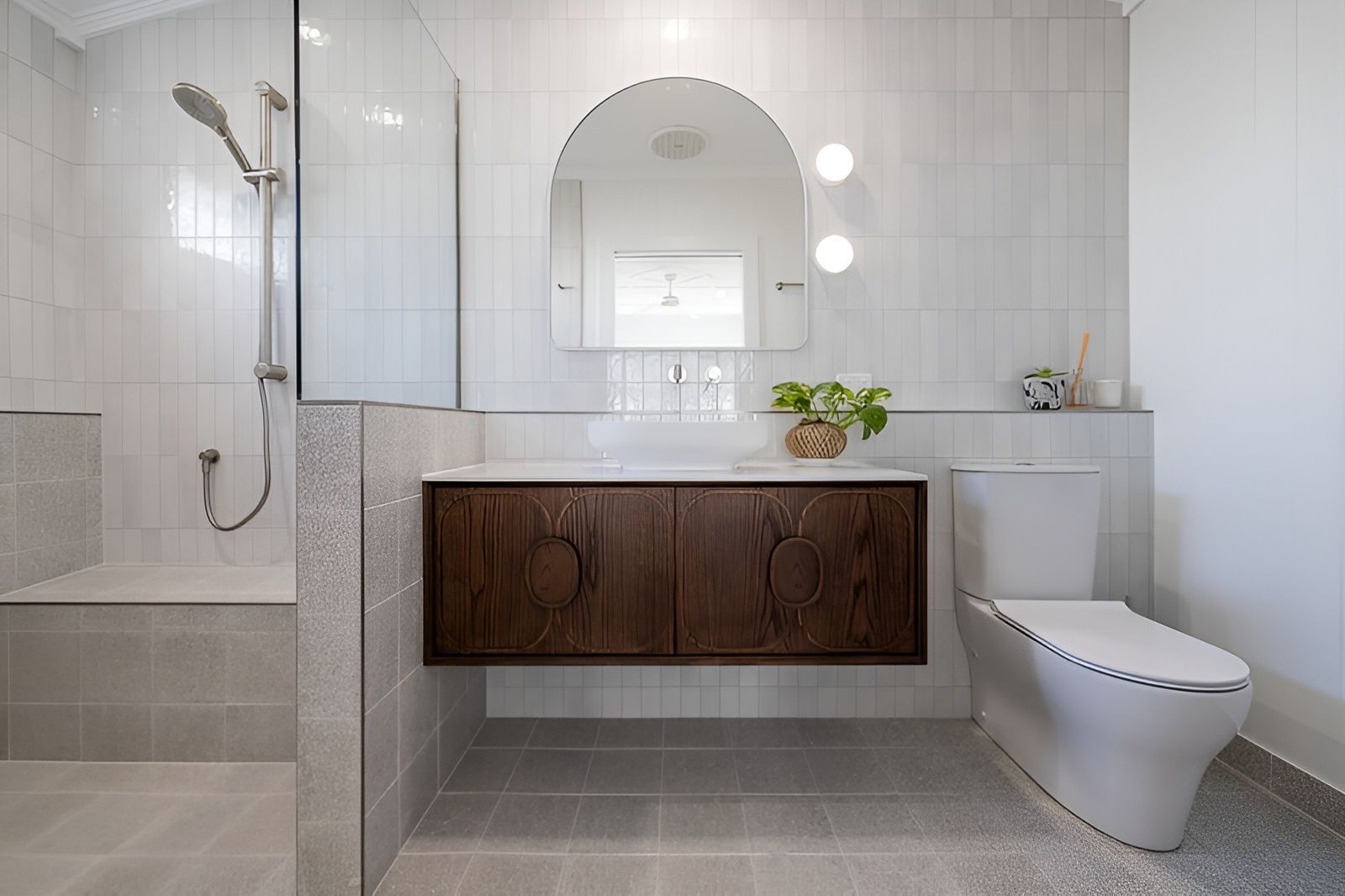 Bathroom With A Walk-In Shower, Sink And Mirror — Ironbark Built Townsville in Currajong, QLD