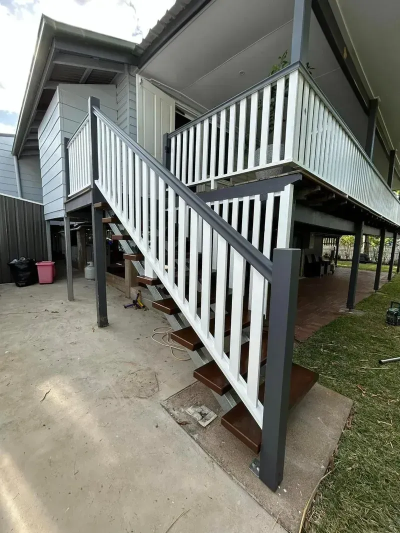 There are Stairs Leading Up to the Second Floor of a House — Ironbark Built Townsville in Currajong, QLD