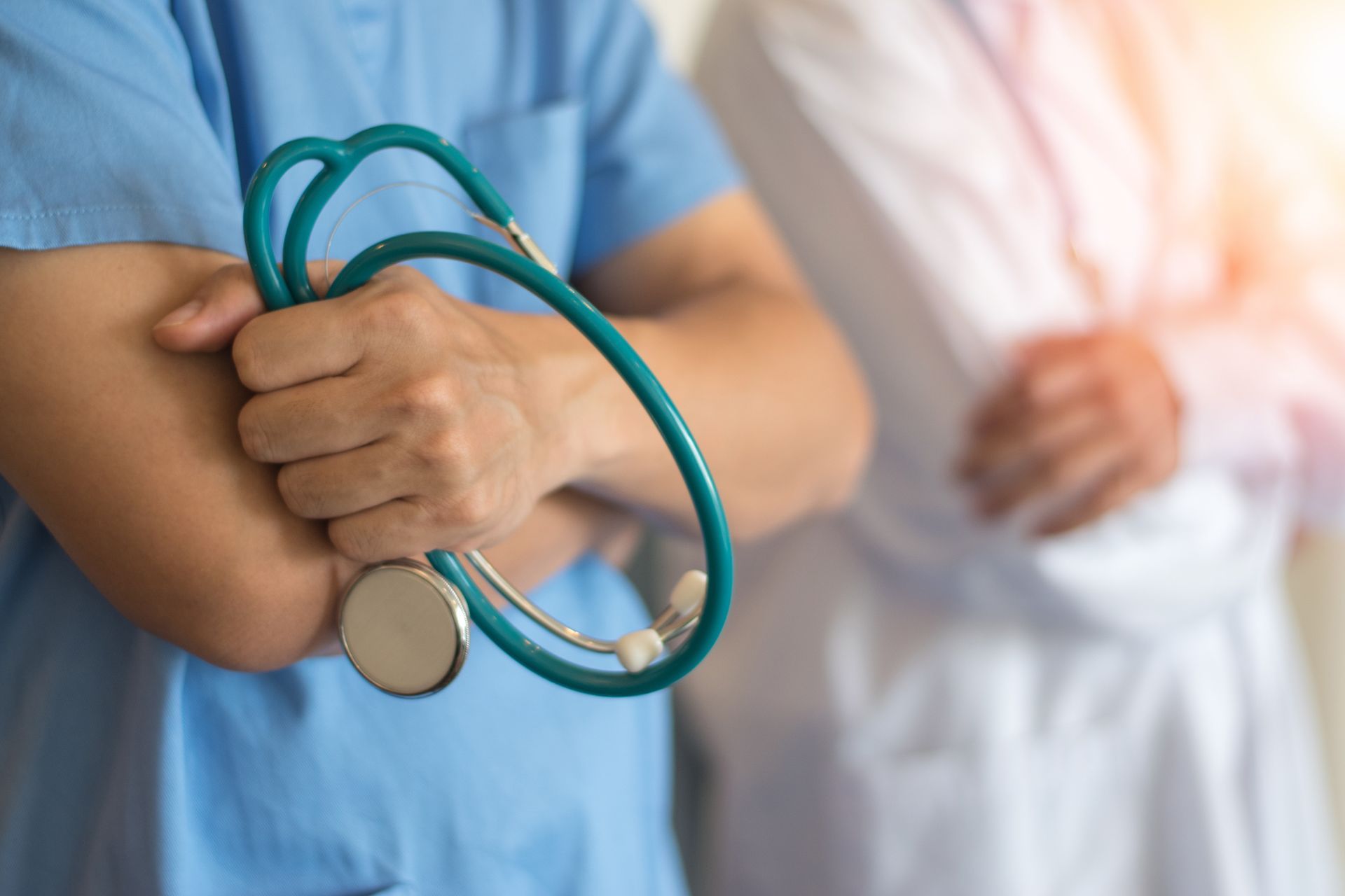 Nurse Holding Stethoscope - San Antonio, TX - La Femme OB/GYN