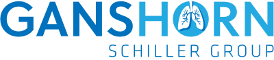 A blue and white logo for ganshorn schiller group