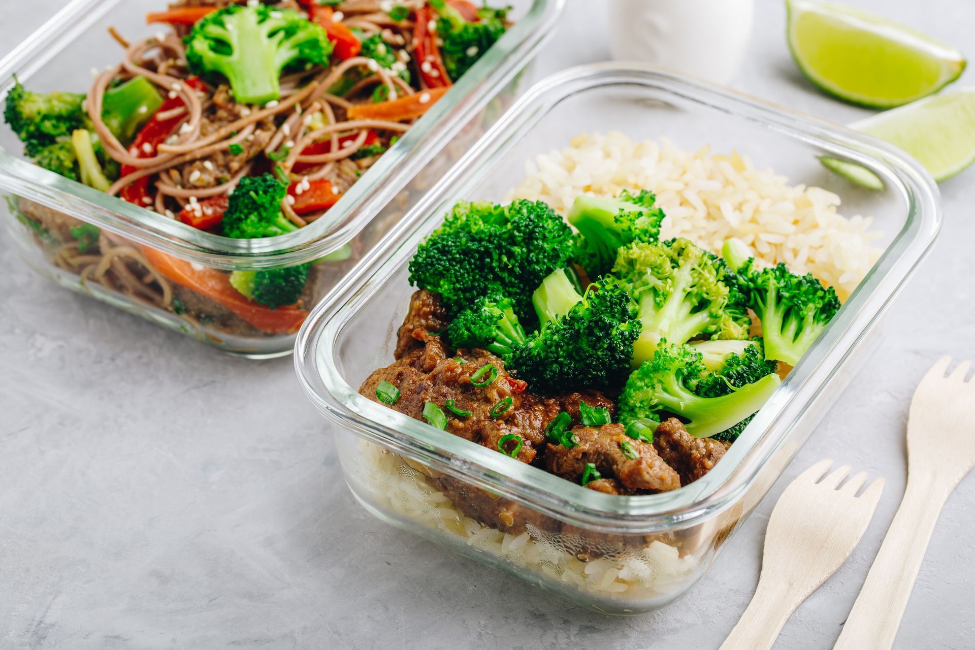 Beef Broccoli Stir Fry Meal Prep lunch box container on gray stone background.