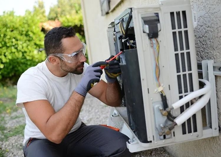 Electrician Repairing Air Conditioning in Alice Springs