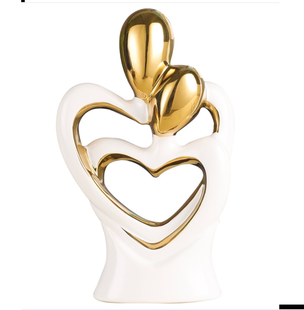Gold and white heart-shaped trophies on a shelf with a gray striped background