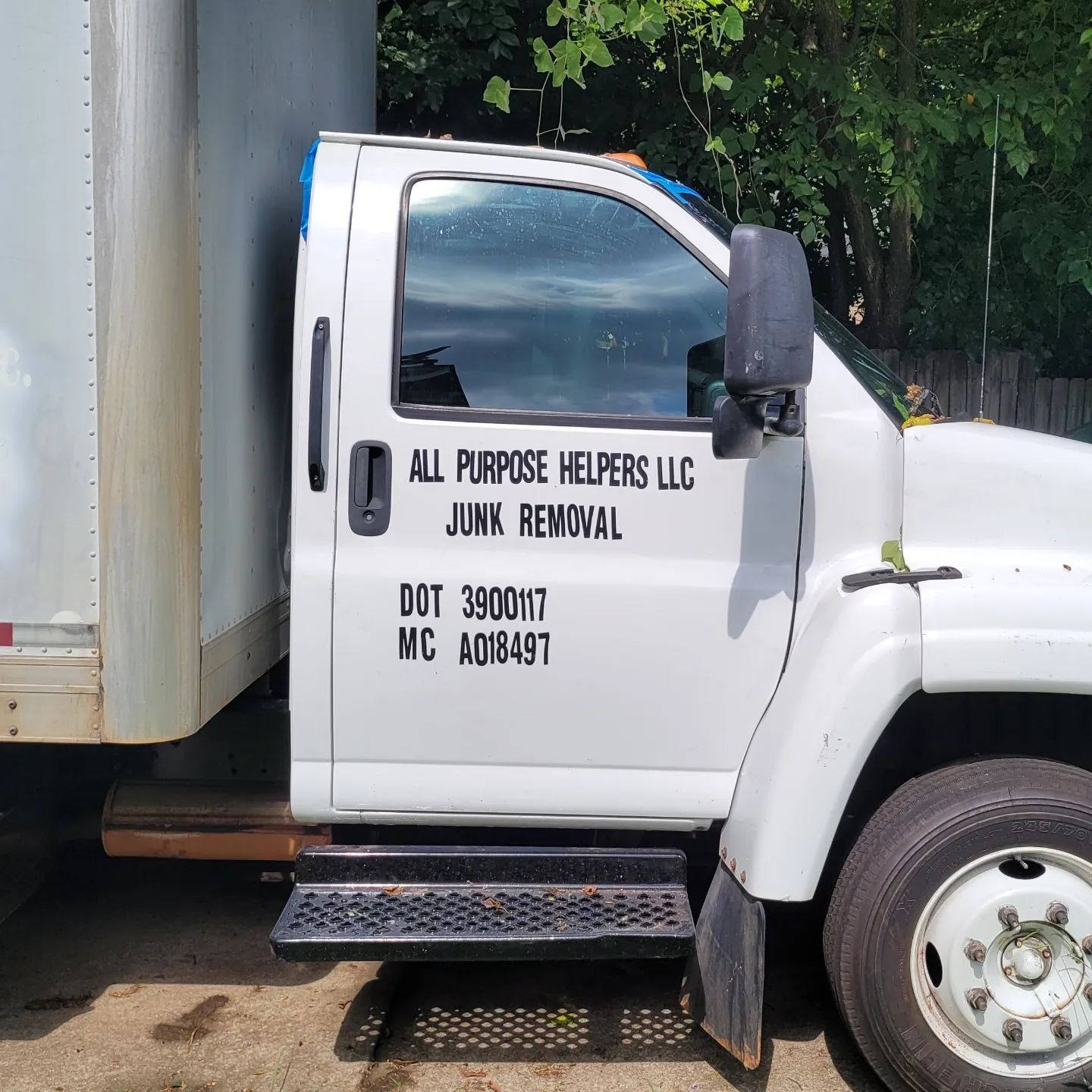 White box truck with text 