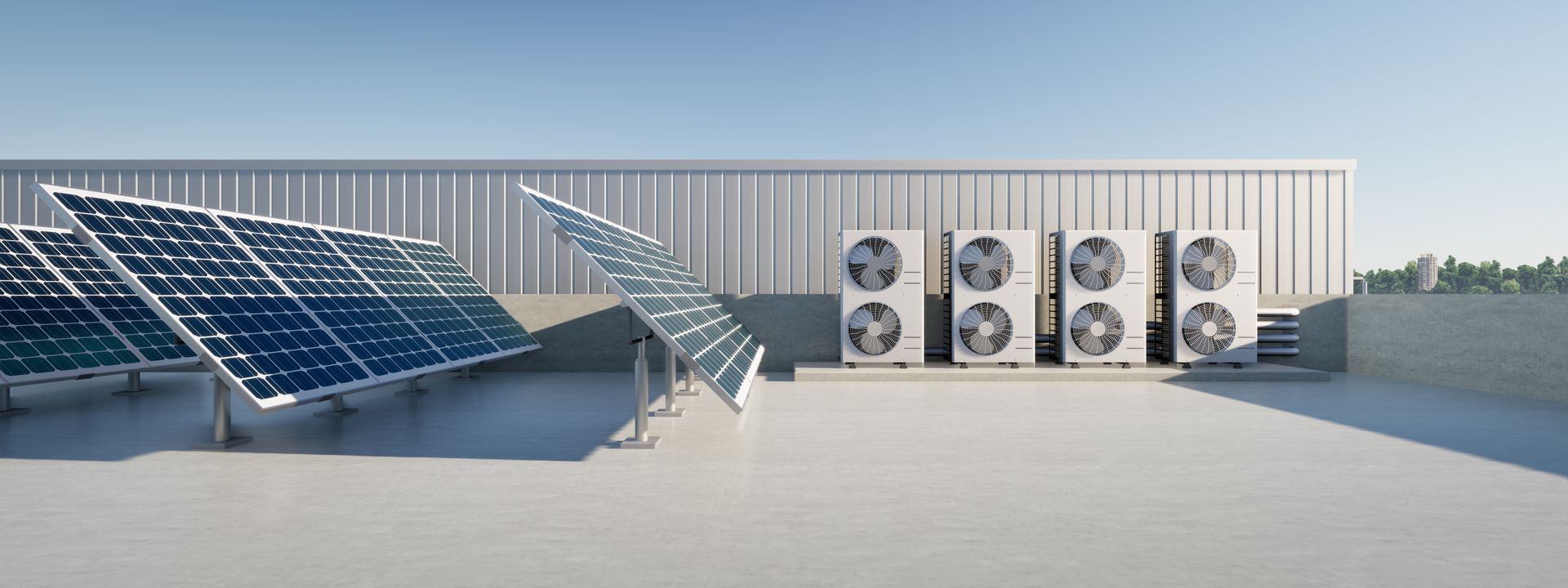 Rooftop solar panels beside industrial HVAC units under a clear sky