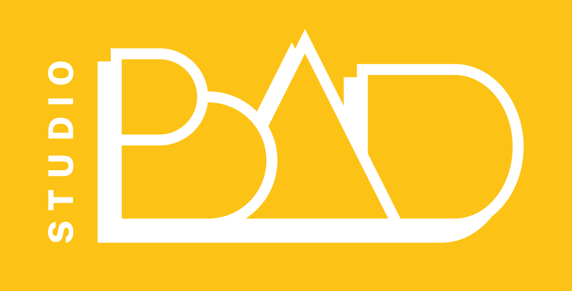 Yellow Studio DAD logo with white stylized letters and outlined triangle on a gold background
