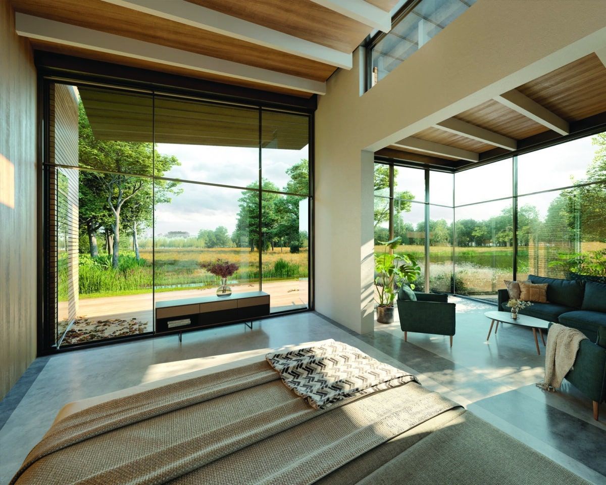 Modern living room with floor-to-ceiling glass walls, wooden beams, and views of lush greenery outside