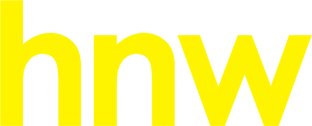 Yellow lowercase letters “hnw” on a white background