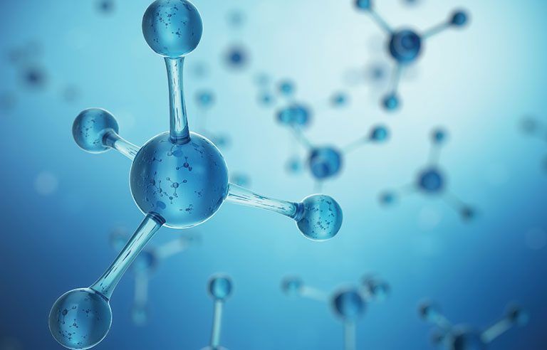 A close up of a molecule on a blue background.