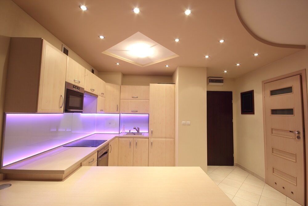 A Kitchen With Purple Lights on the Walls and Ceiling — Sigley Electrical in Mooball, NSW