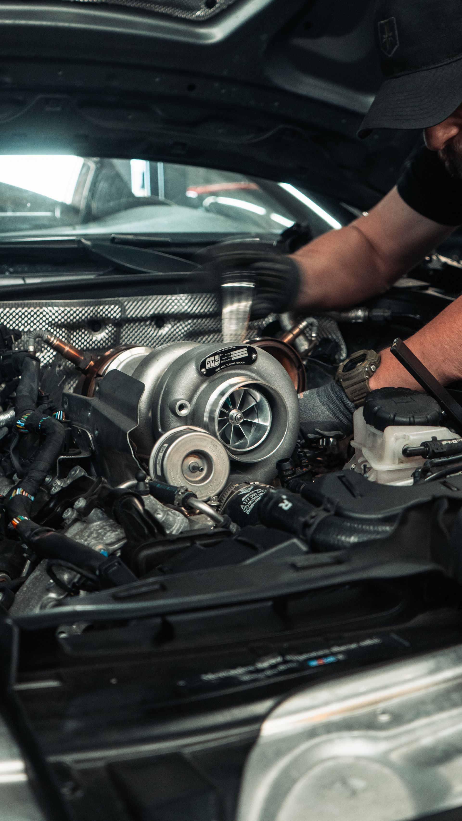 Our technician is working on customizing a vehicle's engine in Scottsdale, AZ | Dyno-Comp
